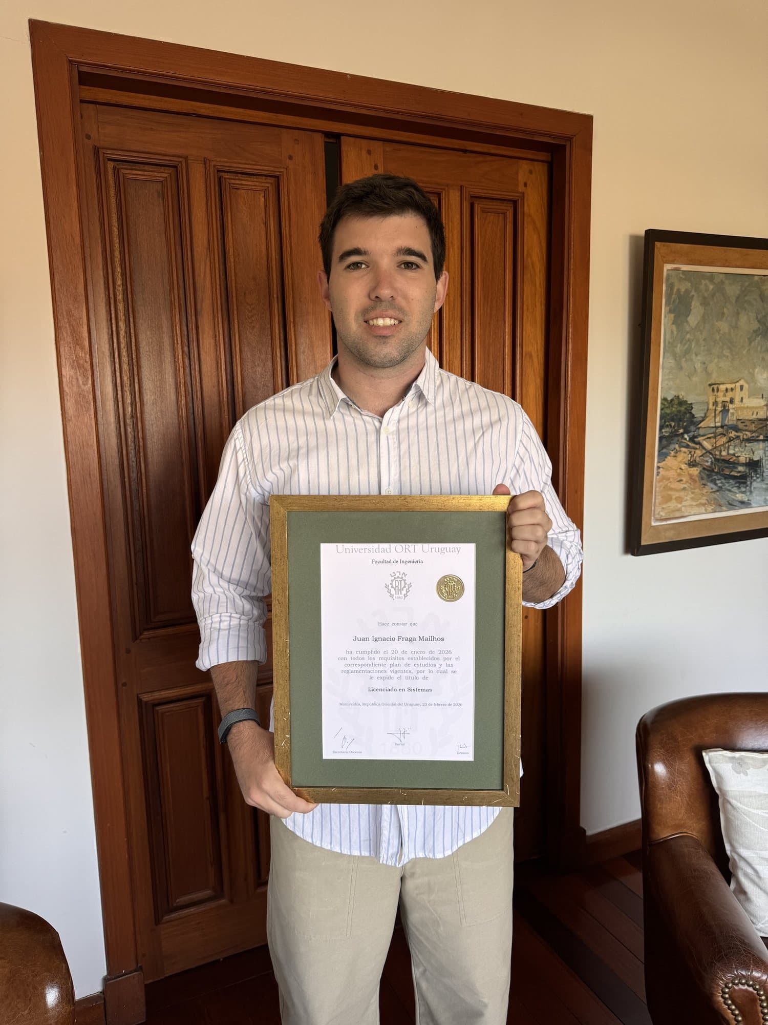 Juani with the ORT diploma